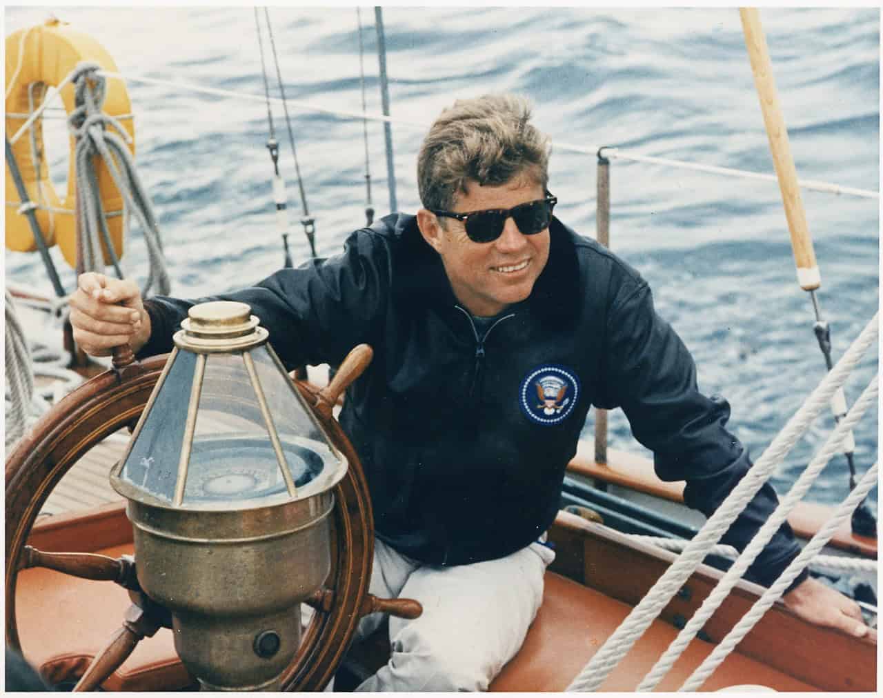 JFK At the wheel of the US Coast Guard Yacht Manitou