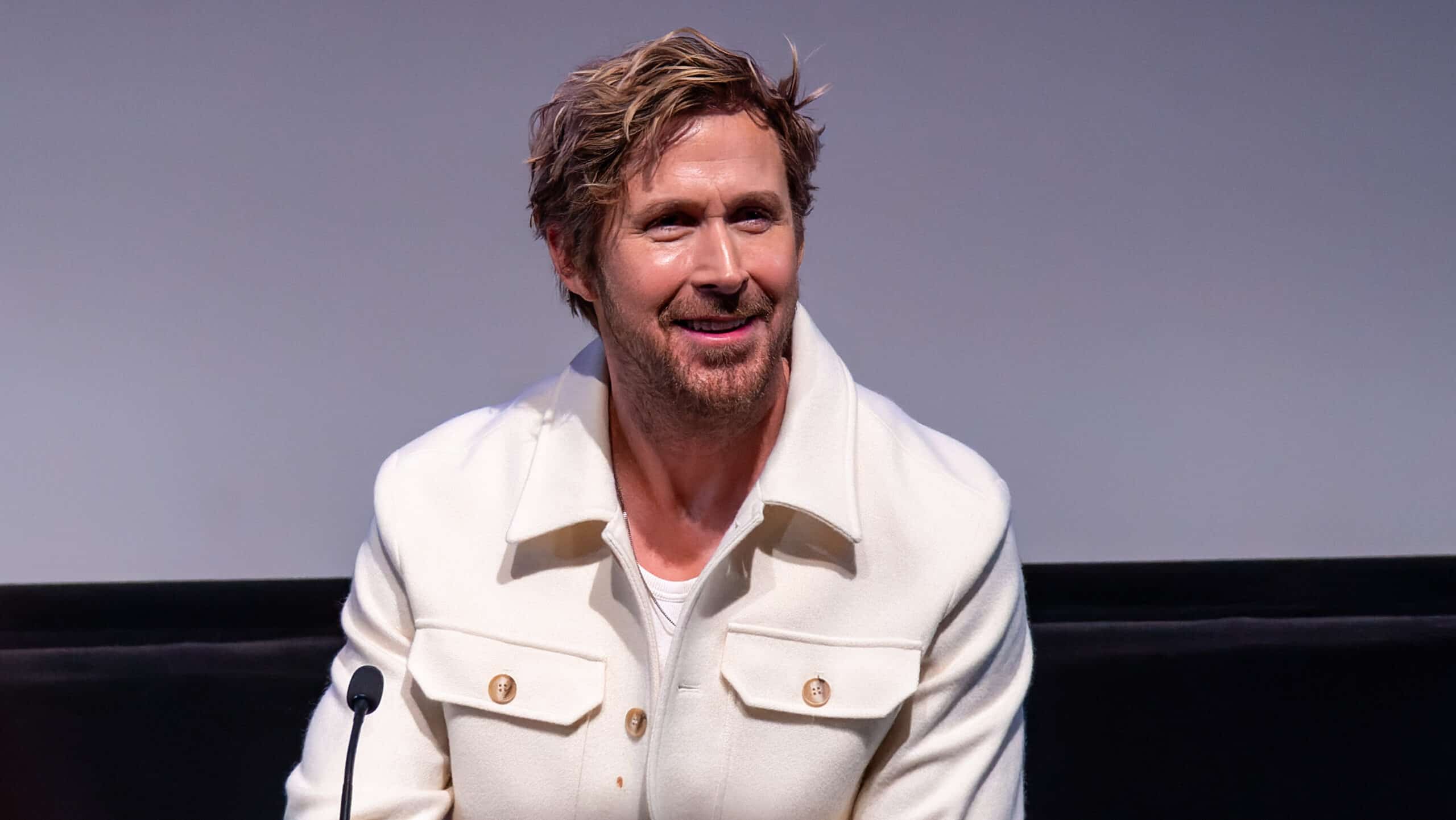 Ryan Gosling wearing a white overshirt