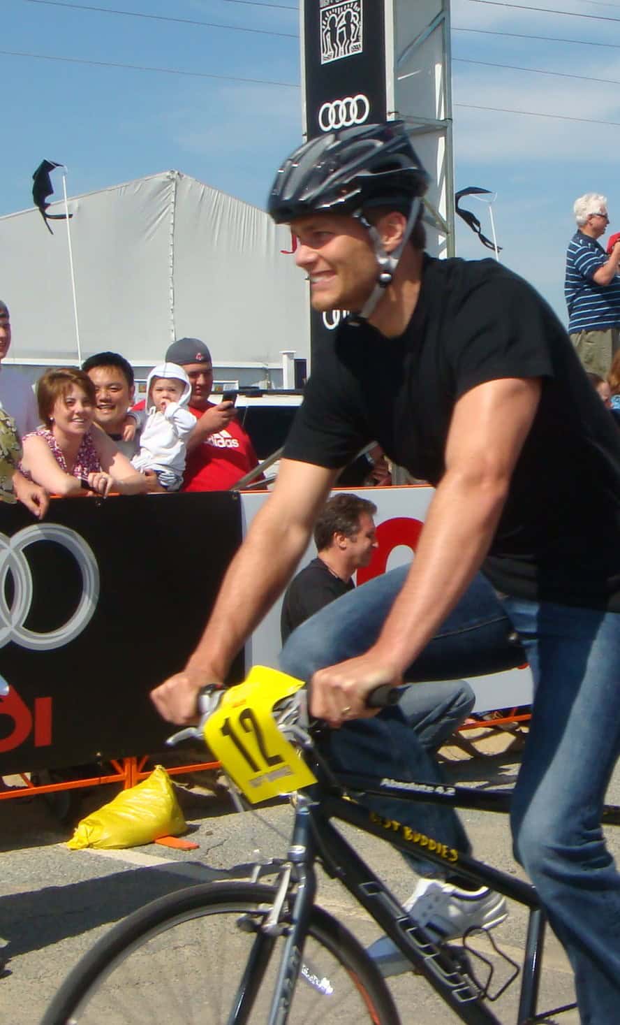 Tom Brady rides a bicycle at Buddy Ride charity event in Hyannis Massachusetts 2009