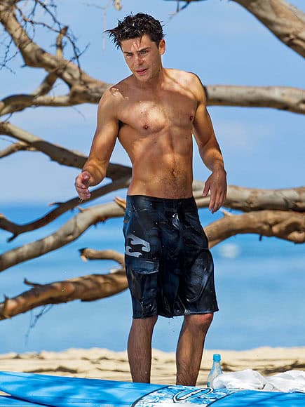 Zac Efron by a tree