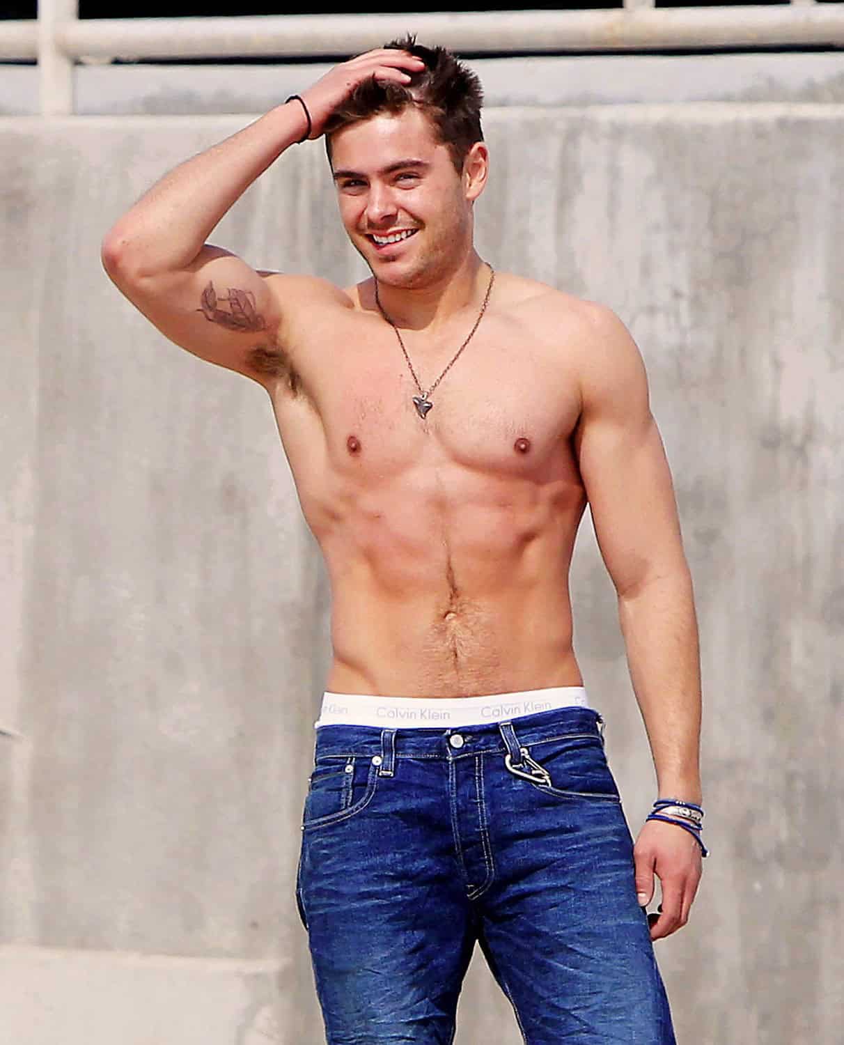 Zac Efron bicep tattoo