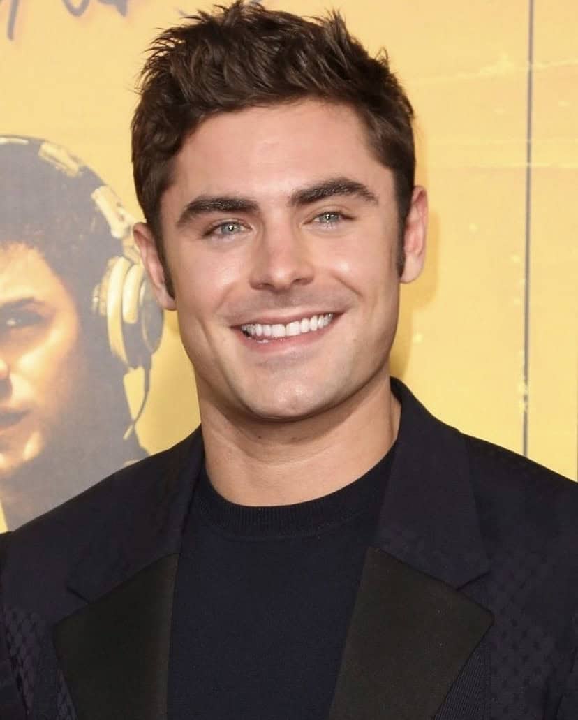 Zac Efron in a navy blazer