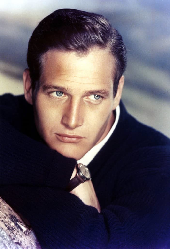 Paul Newman wearing a navy sweater