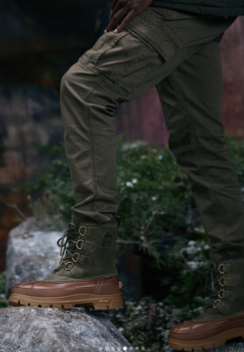 High-quality outdoor hiking boots with durable lug soles, waterproof leather, and ankle support for rugged terrain and outdoor adventures. Perfect for hiking, trekking, and outdoor clothing enthusiasts.